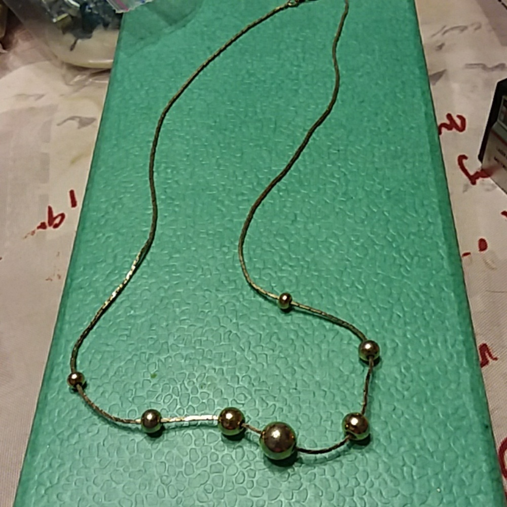 Gold bead necklace